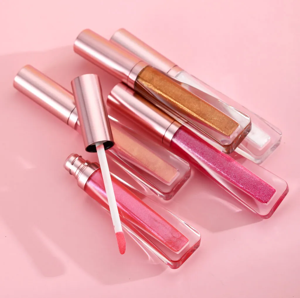 Wholesale sparkly & shimmer lip gloss no label with Rose gold packaging | LG0371